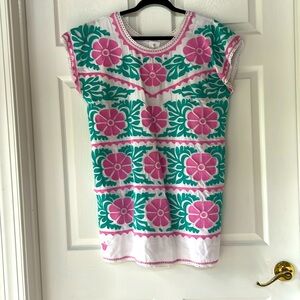 Fun floral dress. Embroidered, has pockets, medium